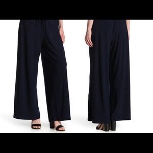 Vince Camuto black sleeveless jumpsuit.